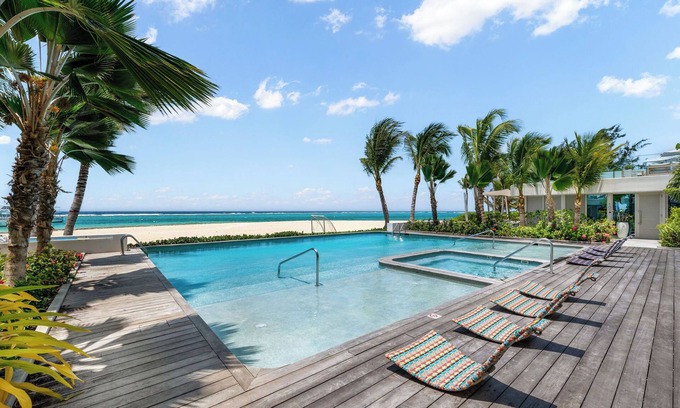 South Sound Eigentumswohnung | Tides 403-Luxury Beachfront Condo in South Sound - Minimum 28 Night Rental