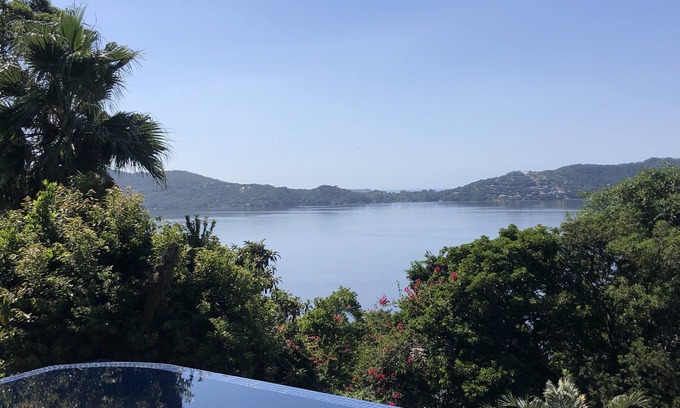 Lagoa da Conceicao Haus | Top Haus!Mit einem paradiesischen Blick auf das Meer und die Lagune von Conceição, einzigartige Architektur!