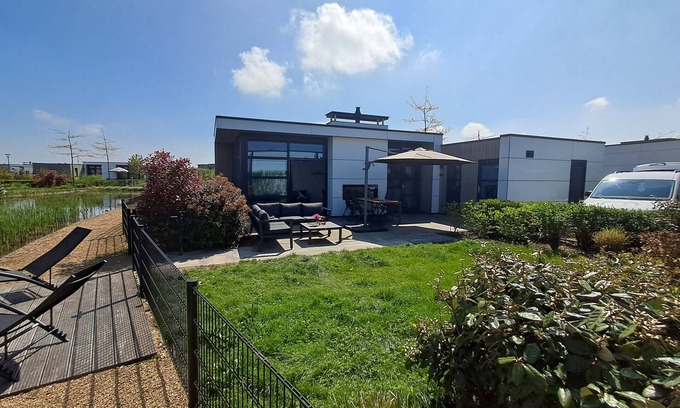 Olburgen Haus | Top-modernes Chalet 'Land in Sicht' mit großem Garten an der IJssel