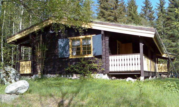 Gunnarskog Haus | Traumhaftes Blockhaus nahe Fredros im Värmland, Schweden mit Boot am See