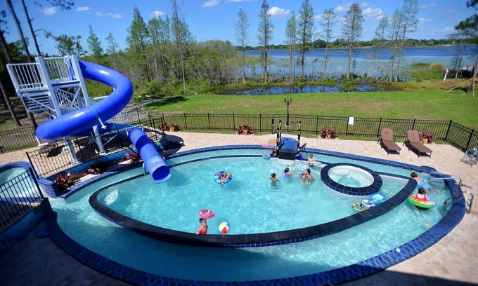 Groveland Haus | Two 10 Acre Huge Pool Estates with Waterslides & Lazy Rivers - Sleep Up To 97