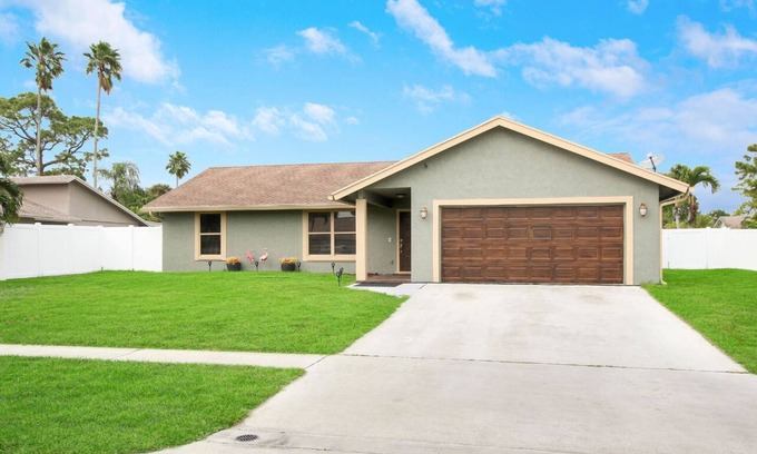 Royal Palm Beach Haus | Upscale 4BR Oasis- Tranquil Patio, Prime Location