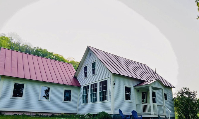 Chelsea Haus | VAST trail access with peaceful views & cozy spaces in VT schoolhouse.