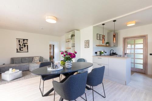 Westerholz Haus | VITA Sonnholm - modernisiertes Häuschen mit Garten am Meer