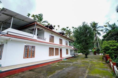 Krishnagiri Wohnung | Wayanad Palm Grove Retreat 1st Floor