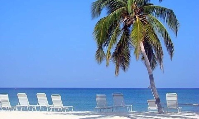 Seven Mile Beach Eigentumswohnung | Ihr Strand Ferienhaus erwartet Sie! Sehen Sie sich unsere Preise für September / Oktober 2019 an!