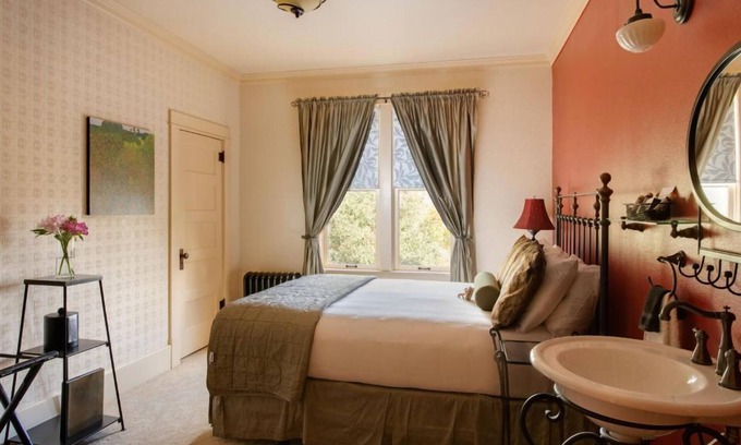 Cody Hotel | Western Charm Awaits in this Cozy Room w/ Complimentary Breakfast