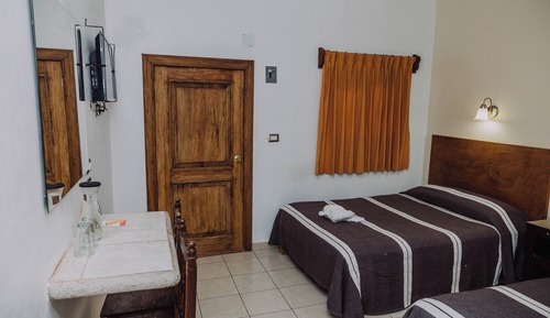 Habitacion Superior 2 camas matrimoniales con aire acondicionado