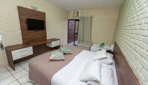 Standard-Doppel- oder -Zweibettzimmer, Mehrere Betten, eingeschränkter Meerblick, zum Garten hin