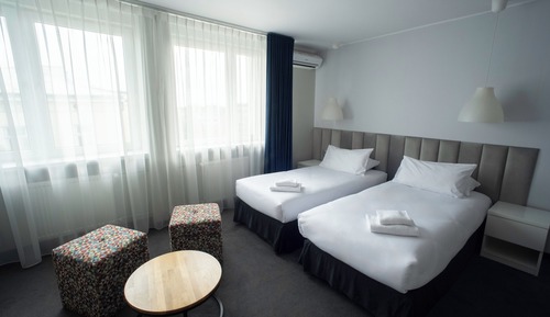 Premium-Doppel- oder -Zweibettzimmer