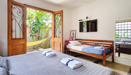 Habitación triple Deluxe con bañera de hidromasaje