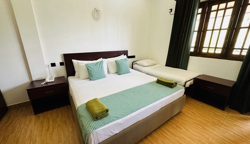 Deluxe-Dreibettzimmer