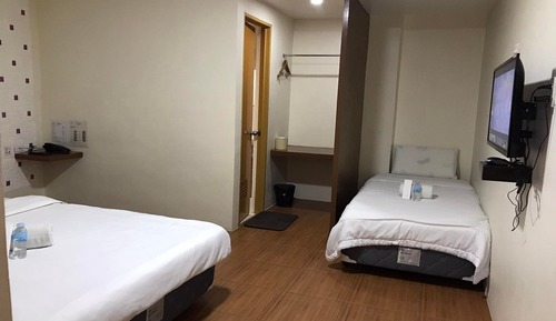 Deluxe-Dreibettzimmer