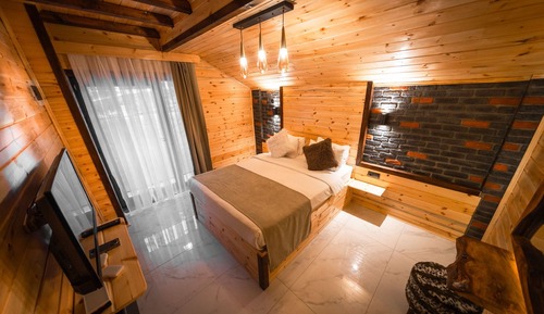 Deluxe-Zimmer, Kamin, Bergblick