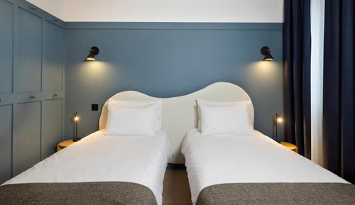 Doppel- oder Zweibettzimmer