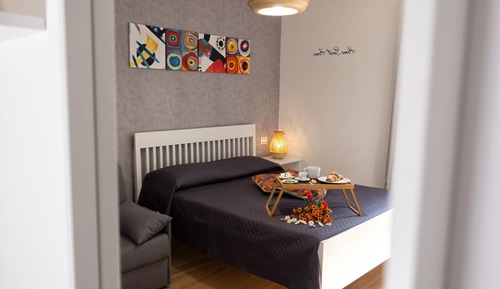 Deluxe-Vierbettzimmer, 1 King-Bett und Schlafsofa
