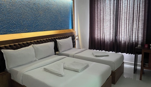Deluxe-Dreibettzimmer