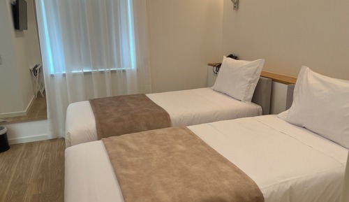 Standard-Zweibettzimmer, 2 Einzelbetten, barrierefrei, Gartenblick