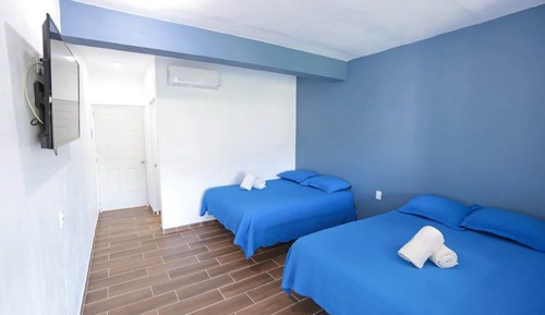 Junior-Zimmer, 2 Queen-Betten, Poolblick