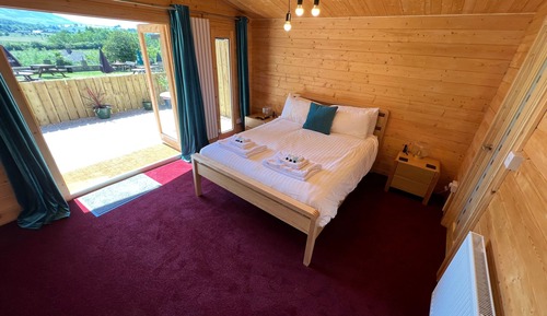 Superior-Ferienhütte, mit Bad, Gartenblick (Patio)