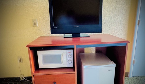 Deluxe-Einzelzimmer, 1 King-Bett, Nichtraucher, Kühlschrank und Mikrowelle