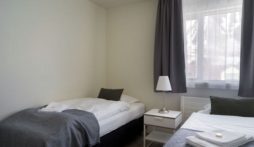 Doppel- oder Zweibettzimmer, Gemeinschaftsbad