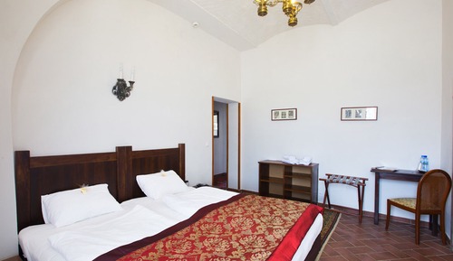 Doppel- oder Zweibettzimmer