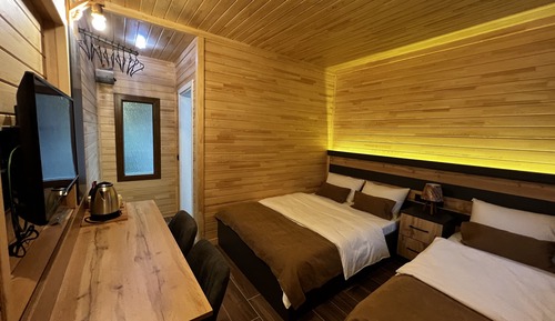Deluxe-Dreibettzimmer