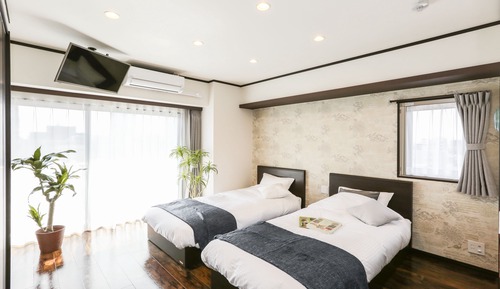 Zweibettzimmer, 2 Einzelbetten (with Futon, 202)