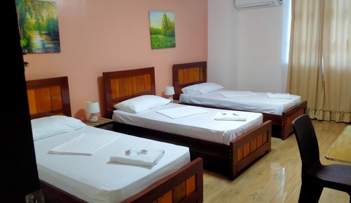 Doppel- oder Zweibettzimmer, Gemeinschaftsbad (Calla)