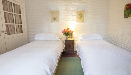 Doppel- oder Zweibettzimmer