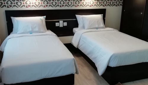 Doppel- oder Zweibettzimmer
