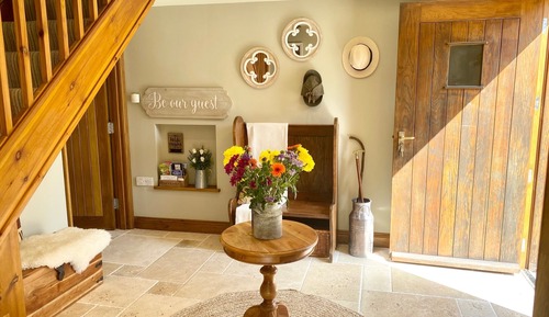 Deluxe-Ferienhaus, eigenes Bad, Gartenblick (The Coach House)