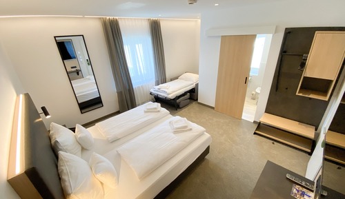 Comfort-Dreibettzimmer