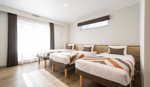 Deluxe-Dreibettzimmer