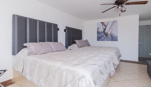 Deluxe-Zimmer, Mehrere Betten, Balkon, eingeschränkter Meerblick