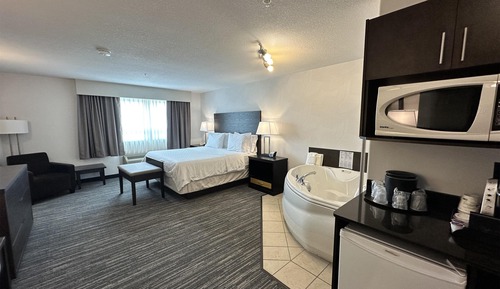 Suite, 1 King-Bett, Nichtraucher, Whirlpool (Dining Table)