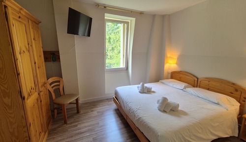 Doppel- oder Zweibettzimmer