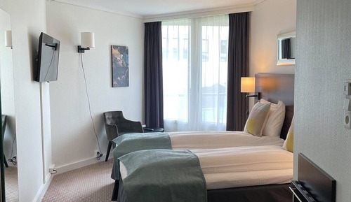 Comfort-Doppel- oder -Zweibettzimmer