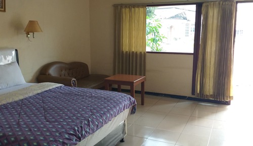 Junior-Doppel- oder -Zweibettzimmer