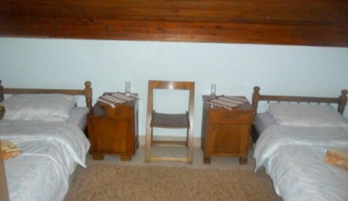 Doppel- oder Zweibettzimmer