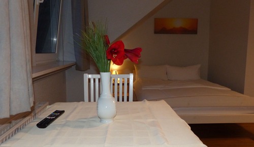 Doppel- oder Zweibettzimmer