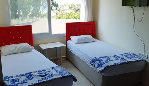 Design-Dreibettzimmer