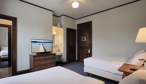 Historic Hotel (Accessible by Stairs) - Two Adjoining Rooms - Four Double Beds - One Bath