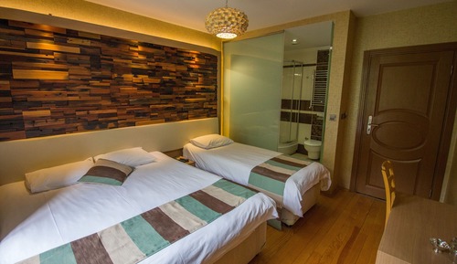 Deluxe-Dreibettzimmer