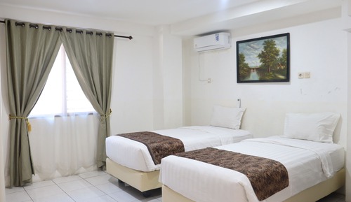 Premium-Doppel- oder -Zweibettzimmer