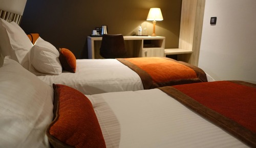 Doppel- oder Zweibettzimmer