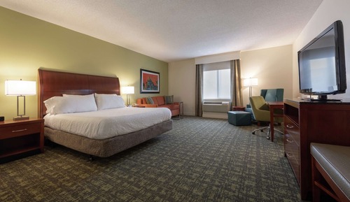 Deluxe Evolution, 1 King-Bett