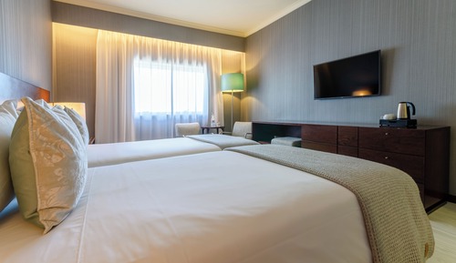 Doppel- oder Zweibettzimmer (2 adults + 1 child)