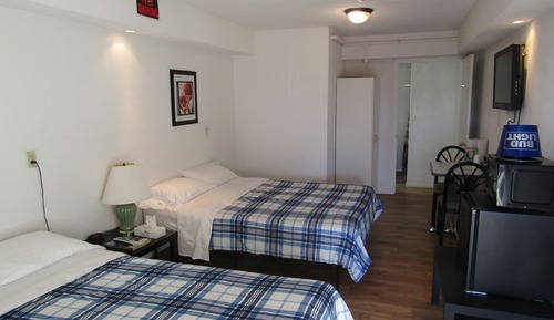 Deluxe-Dreibettzimmer (Deluxe Room One Queen, One Single)